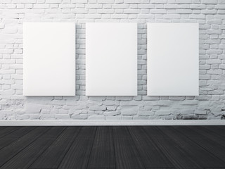 Three poster hanging on the wall in the interior. mock up