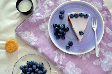 Yogurt cake with blueberries and biscuit base