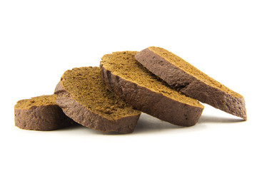 Slices of black bread isolated on white