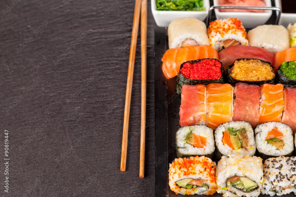 Canvas Prints sushi pieces with chopsticks