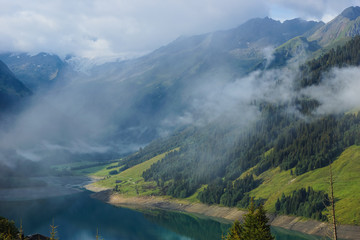 Mountain mist over the lake