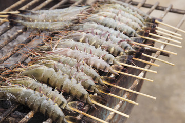 Fresh shrimps grilled on stove