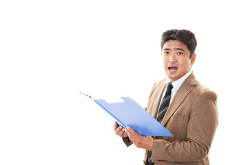 プレゼンをする笑顔のビジネスマン