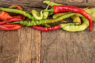 colourful fresh peppers on wooden table