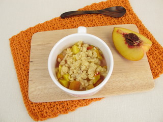 Crumble mug cake with peach from microwave