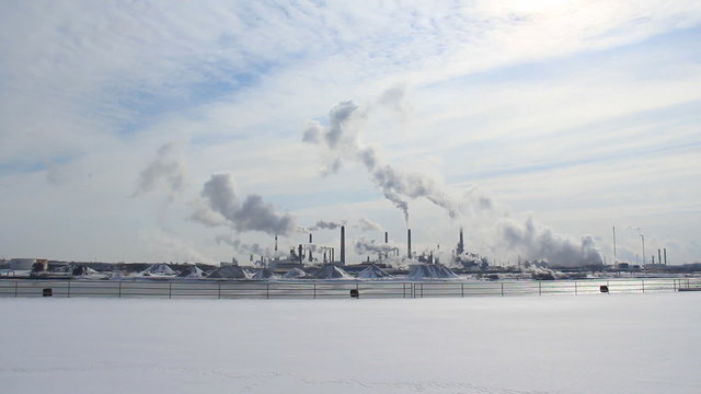 Petrochemical Refinery 2. View of a petrochemical refinery in Sarnia, Ontario, Canada. Shot from across the St. Clair River in Port Huron, Michigan on a cold winter morning.
