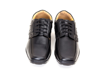 a pair of black leather shoes for men isolated on white available with clipping path