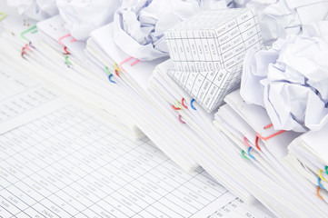 Bankruptcy of house and paper ball on overload paperwork