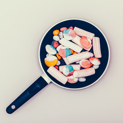 Sweets happiness in frying pan. Vanilla minimal style