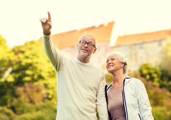 senior couple in city park