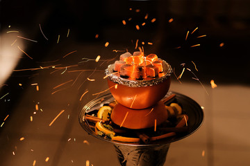 Asian, arabia hookah with charcoal. Smoke © Elina Leonova