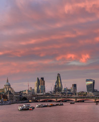 Fototapeta na wymiar Red sunset clouds above the City of London