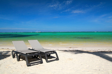 Chaise-longues on beach