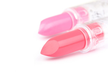 Sliced lipstick isolated on white