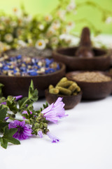 Natural remedy, mortar and herbs