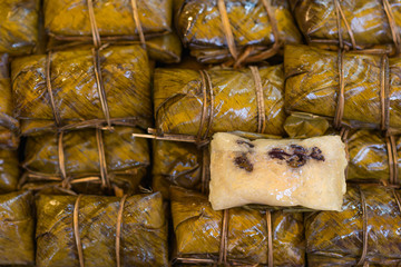 Glutinous rice steamed with banana wrap banana leaf ( Khao Tom M