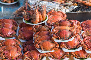 Crab steam in seafood market. Selective focus.