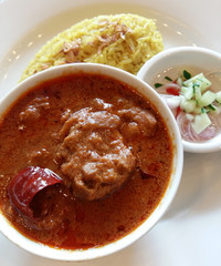 Chicken curry with basmati rice , dish popular in India.