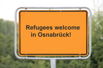 Ein Fl&uuml;chtlingsschild in Osnabr&uuml;ck