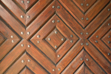 Fototapeta premium Rustic brown wooden door texture