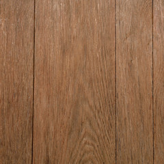 Brown wooden desk texture closeup