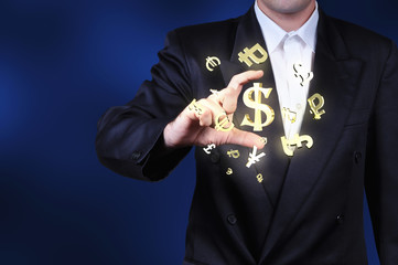Currency gold symbols in a man hand
