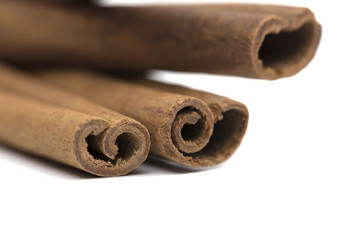 Cinnamon on the white background