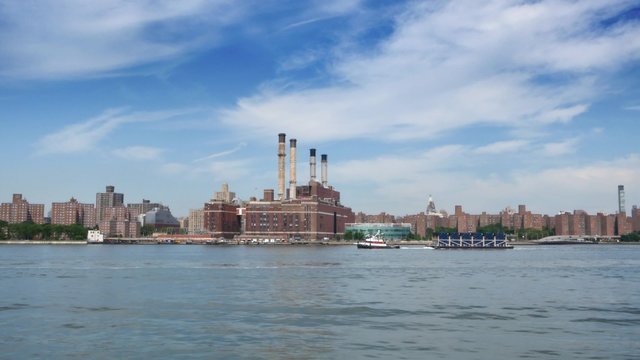 Manhattan Skyline and Con Edison Power Plant as seen from the East River Ferry