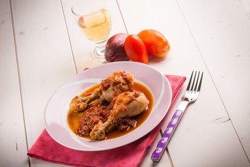 chicken leg with tomato sauce