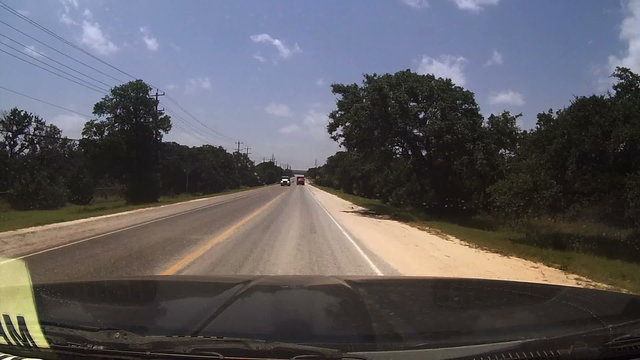 Nearly Missing a Passing Truck on a Highway