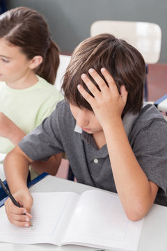 upset boy learning