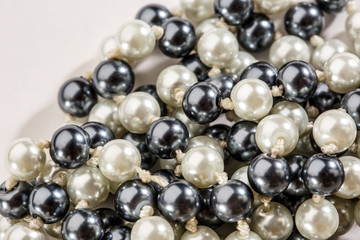 String of black and white pearls