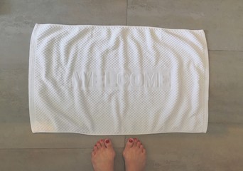 feet and welcome mat
