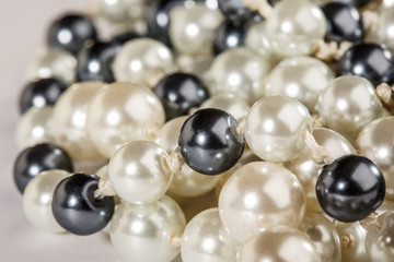 String of black and white pearls