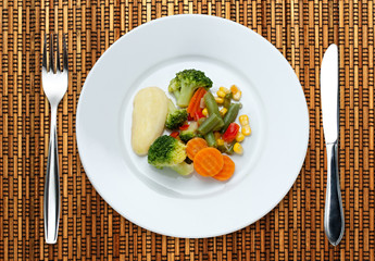 Fried vegetables on the plate