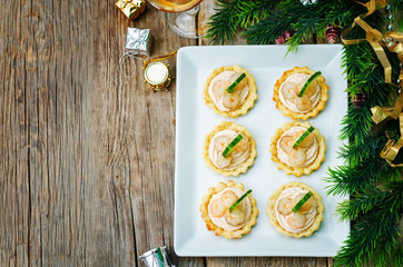 tartlets with salmon mousse, shrimp and cucumber for the New yea