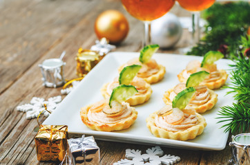tartlets with salmon mousse, shrimp and cucumber for the New yea