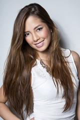 Naklejka premium portrait of beautiful young asian woman with clear, flawless skin and perfect make-up