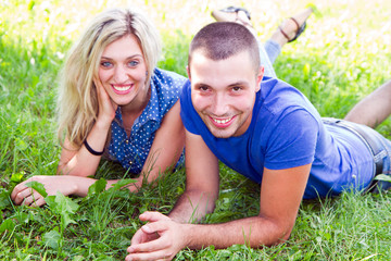 Couple lying down in the park
