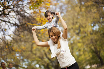 Mother an daughter in the autumn park