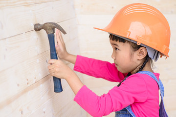 Kid engineer with carpenter work portrait