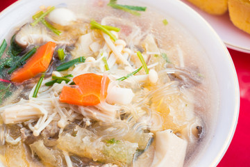 Famous tofu soup with vegetables pork and mushroom, Thai style food.