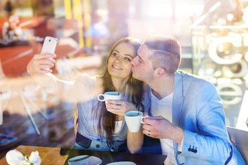 Young couple in cafe