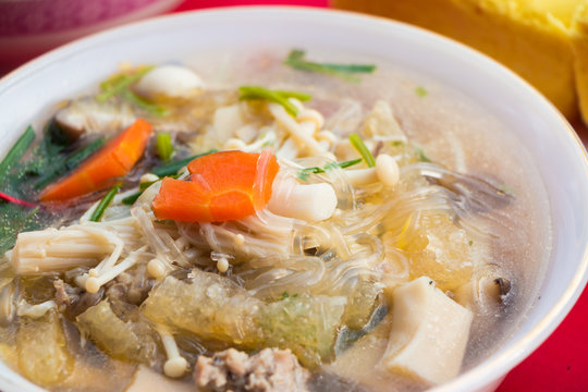 Famous tofu soup with vegetables pork and mushroom, Thai style food.