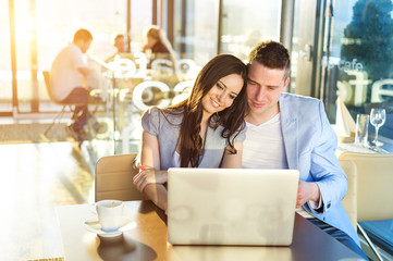 Young couple in cafe