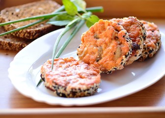 Fish cutlets breaded in sesame