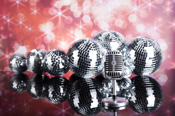 Music background, microphone and Disco Balls 