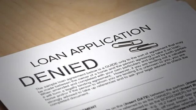 A loan application contract gets denied.