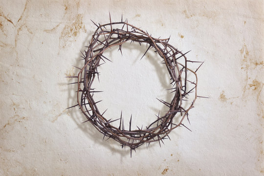 Crown of thorns on textured paper
