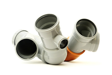 New gray and brown drain pipe, isolated on a white background